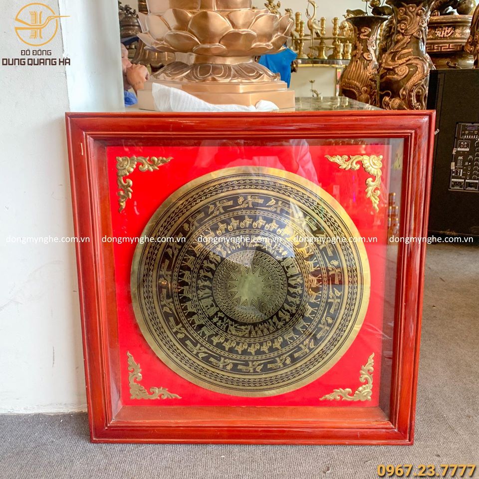 treo tranh mặt trống đồng