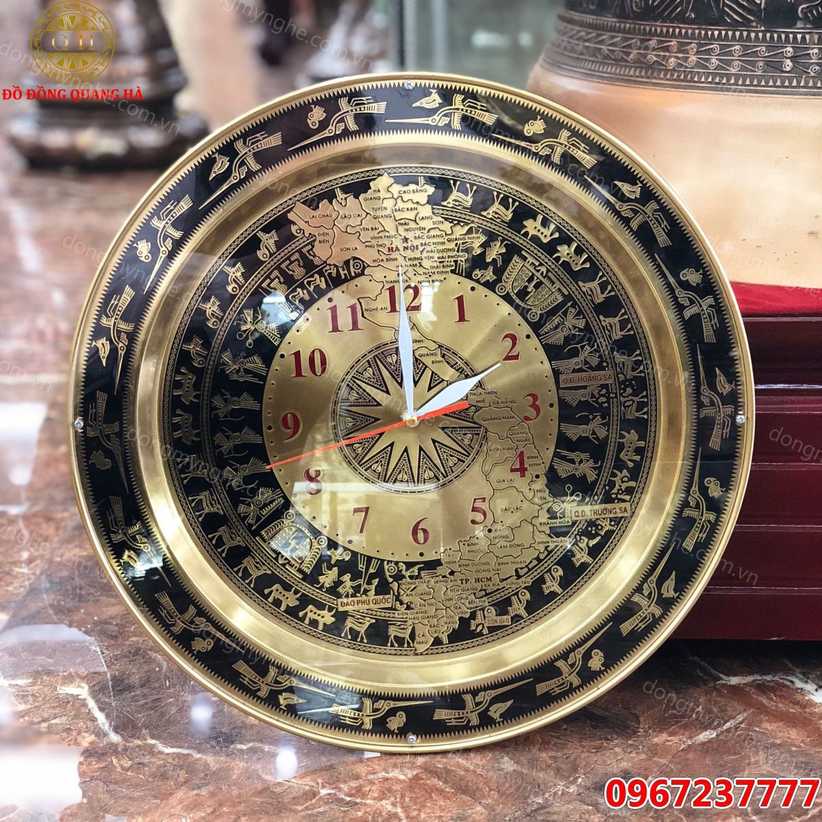 Đồng hồ mặt trống đồng 