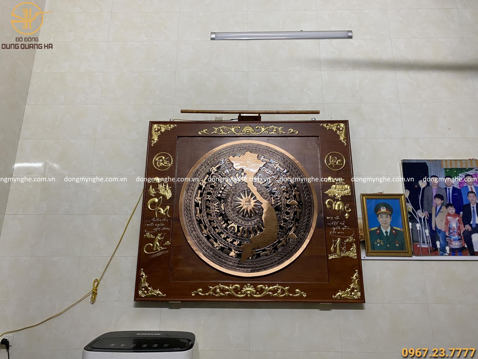 treo tranh mặt trống đồng  treo tranh mặt trống đồng