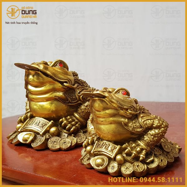 Ý nghĩa phong thuỷ của cóc ngậm tiền