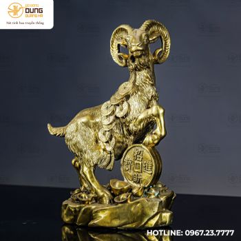 Tượng dê cõng dải tiền bằng đồng vàng cao 27cm