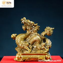 Tượng rồng cầm minh châu bằng đồng vàng kích thước 15x15cm