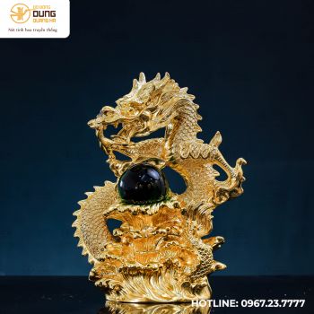 Tượng rồng vờn ngọc bằng đồng vàng dát vàng 9999 cao 35cm ngang 24cm