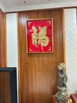 Hoàn thiện và lắp đặt tranh rồng và tranh hũ tiền mạ vàng cho khách hàng tại Quận 7
