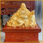 Tượng Phật Di Lặc dựa bị đồng đỏ làm màu